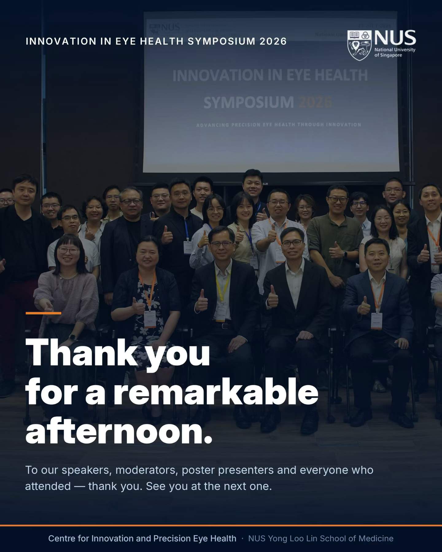 Symposium speakers, organisers and attendees gathered for a closing group photo